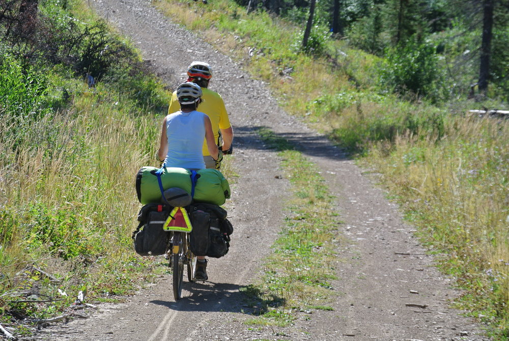 GDMBR: Dennis & Terry Struck, cycling up NF-4134, Photo by Luca.